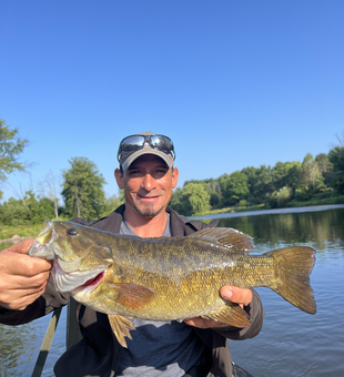 Big Smallmouth Bass bites in clearing skies!