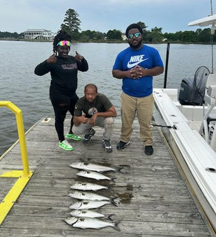 Two big bluefish reeled in at the scenic Lawson Creek Park