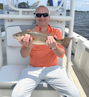 Battling the elements with light tackle on a partly cloudy day.