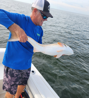 Great catch using light tackle on partly cloudy day!