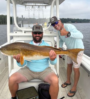 Beautiful Oriental NC redfish making memories on the water!