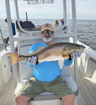 Nice redfish on light tackle! Great adventure fishing in Oriental NC waters.