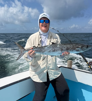 Reeled in a massive 33-inch King Mackerel off the coast!