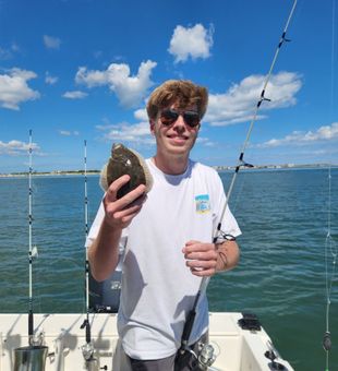 Nice flounder catch on a bay fishing trip