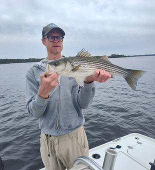 Nice striped bass on light tackle! Clear conditions made for an exciting day on the water.