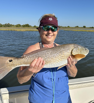 Nice redfish using light tackle and bait casting in Port O'Connor! Perfect clear conditions made for an exciting adventure.