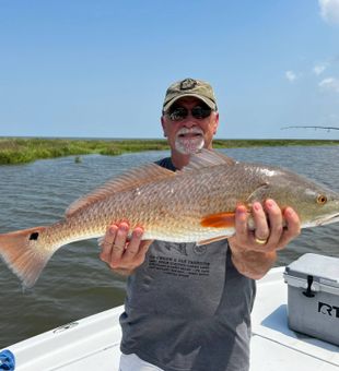 New Orleans Redfish: Hook, line, and sinker!