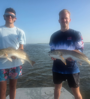 Double redfish delight: Light tackle triumphs in Port Aransas!