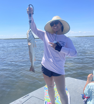 Light tackle drift fishing pays off with a prized redfish!