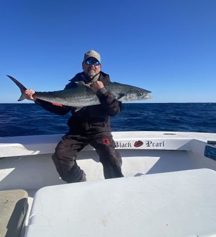 Reel in adventure on a Hatteras sportfishing charter.