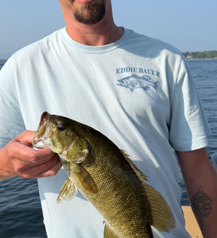 Smallmouth Bass action at Cumberland Head NY under clear skies!