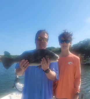Making waves and reeling fish in Destin.