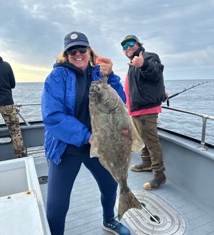 This customer was so excited when she caught her first halibut ever aboard the legacy with Captain Noah!