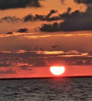 Red Skies and Redfish Game, Corpus Christi, Texas Style.