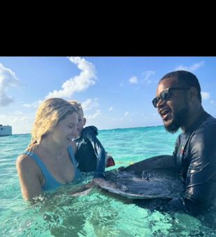 Joyful Stingray City snorkeling moment