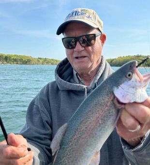 Vibrant rainbow trout from calm lake waters!
