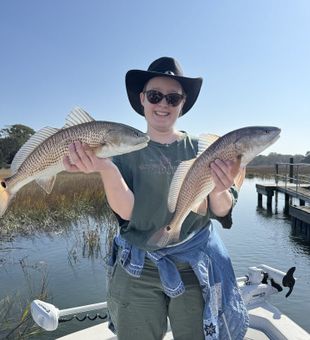 Sunshine, smiles, and fishing rods out on the Charleston waters by Mount Pleasant.