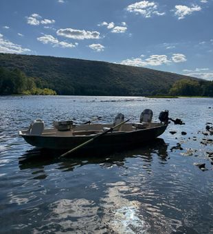 Perfect fishing setup on Lewisburg waters awaits the action.