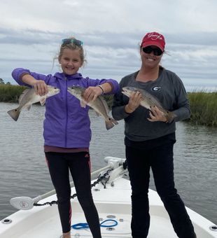 Little red fishes for her - Tybee Island, GA.