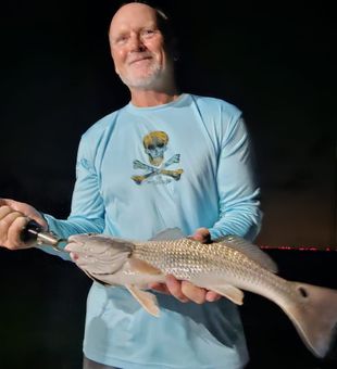 Epic nighttime redfish catch on Gulf Coast inshore fishing charter