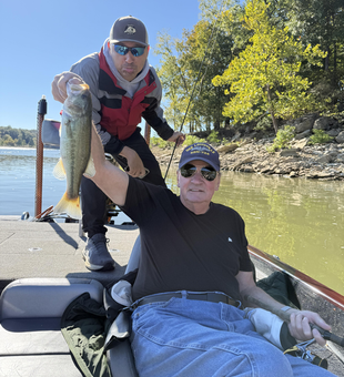 Nice largemouth bass using jigging and trolling techniques in clear conditions!