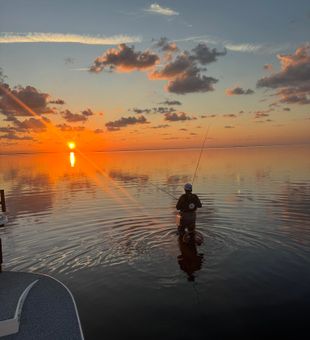 Where the water’s calm and the fish bite hard.