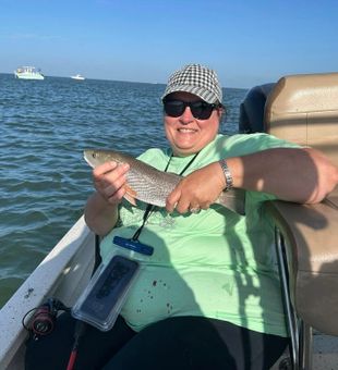 Smiling with a Gulf Coast Redfish