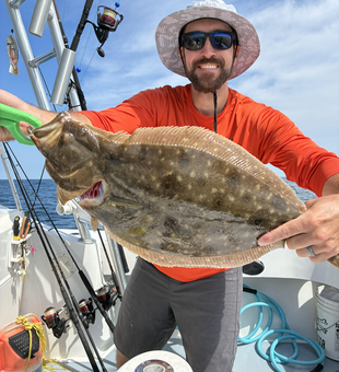 Nice summer flounder on the boat today! Clear conditions made for an exciting adventure.