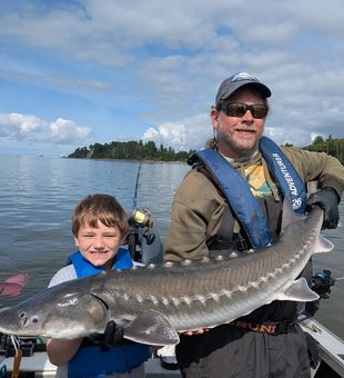 Astoria white sturgeon making memories on the water!