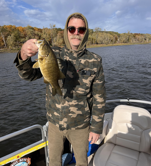 Nice smallmouth bass using deep sea jigging and trolling techniques on the lake today.