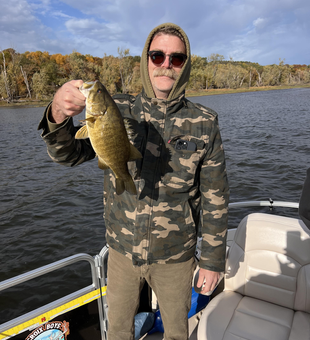 Nice smallmouth bass using deep sea jigging and trolling techniques before the afternoon rain rolled in.