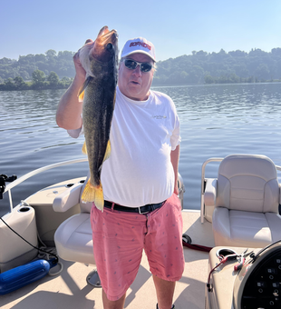 Reeling in a huge catch with deep sea techniques in Stillwater!