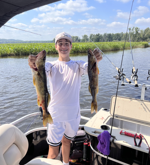 Huge walleyes and partly cloudy skies make for an epic fishing day!