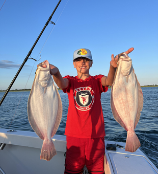 Hauling in huge catches with heavy tackle at Jones Inlet Marine!