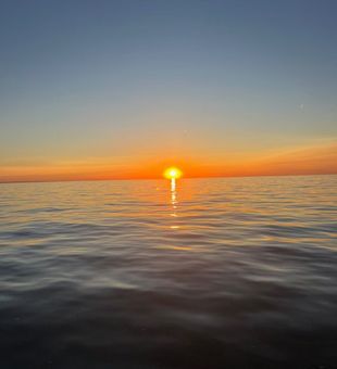 Sunset by the lake in Lake Erie Charters