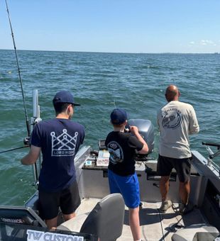 "Lines tight, rods ready, and the crew locked in! Perfect day chasing walleye on the open water!"