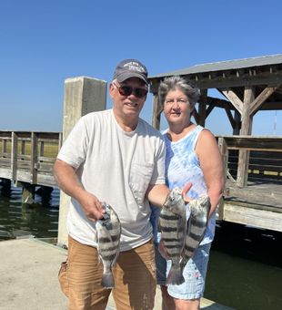 Sunrise over Charleston Harbor and a trophy catch – Mount Pleasant never disappoints.