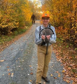Happy hunter with a grouse at Maine Upland!
