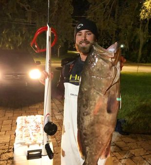 Flexing this Grouper that I had catch