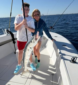 Sharp barracuda boat-side