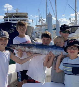 Excited wahoo crew! 🐟