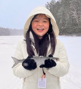 Winter does not stop this young angler from catching fish - Saranac Lake, NY.