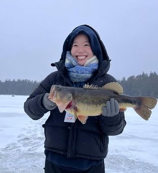 Big Bass reeled in - Saranac Lake, NY.