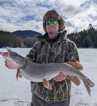 Hooked big pike in Paul Smiths, NY