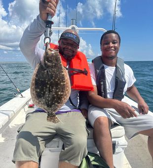 Father and Son Flounder fishing in NC