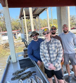 Mixed bag of Brunswick redfish, flounder, and speckled trout!