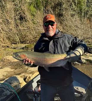 Early morning salmon bite during a guided fishing charter in Coos Bay, OR.