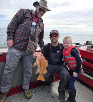 Bright day, vibrant rockfish, happy anglers.