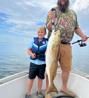 Father and Son Redfish Catch!