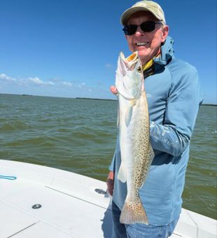 Shallow water success with a nice trout!